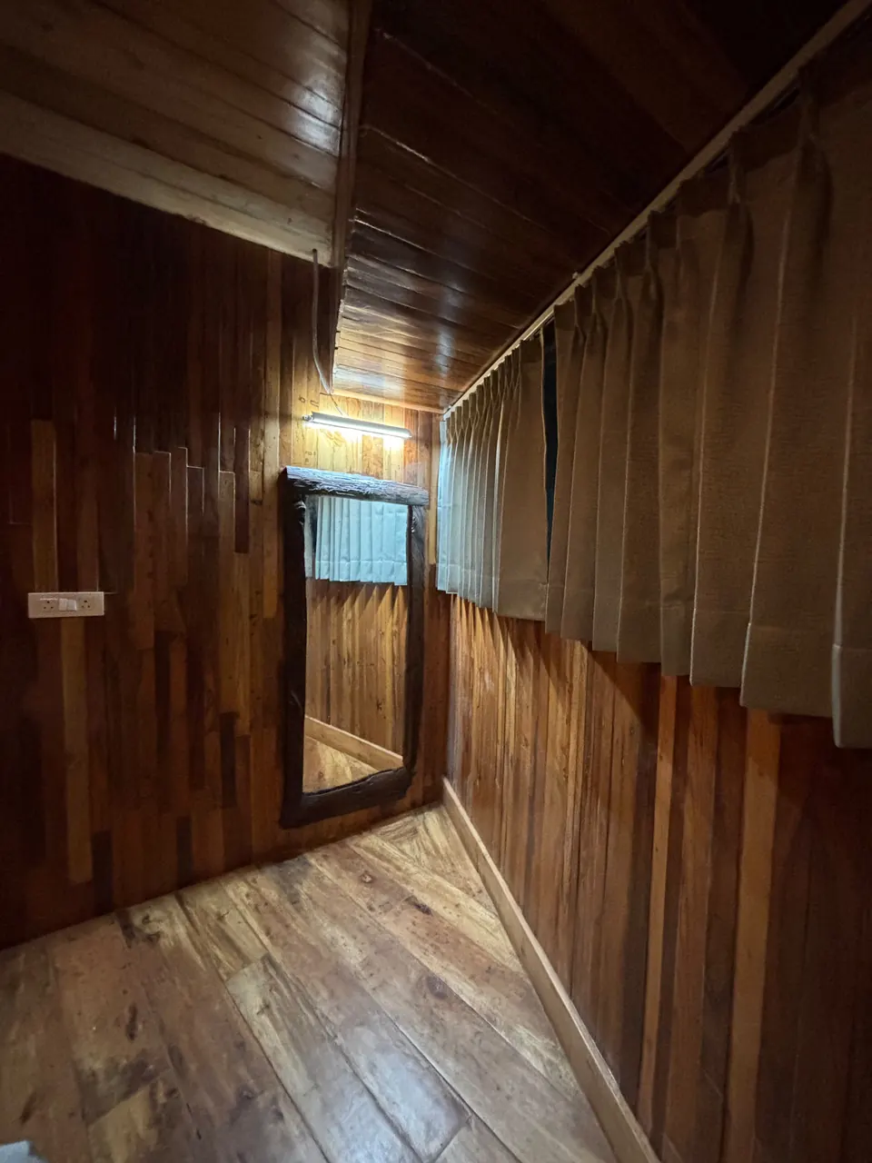 Wood-panelled cabin hallway